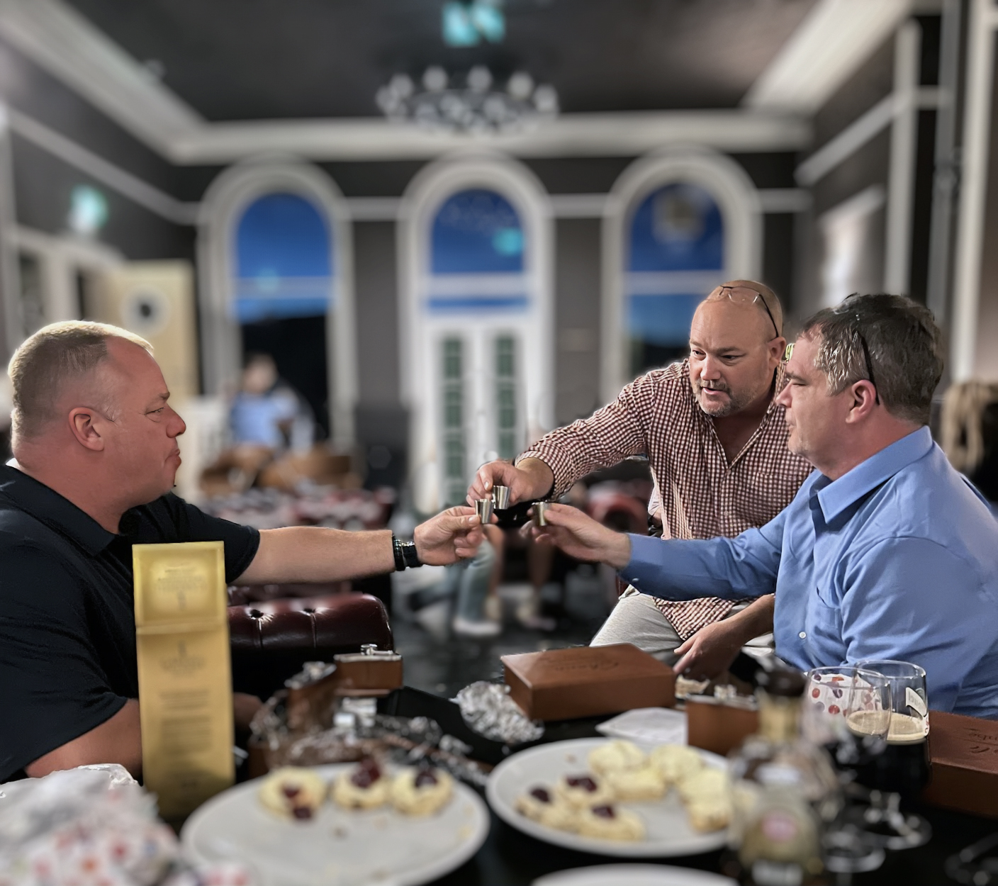 Dale with his two brothers, toasting at their first meeting