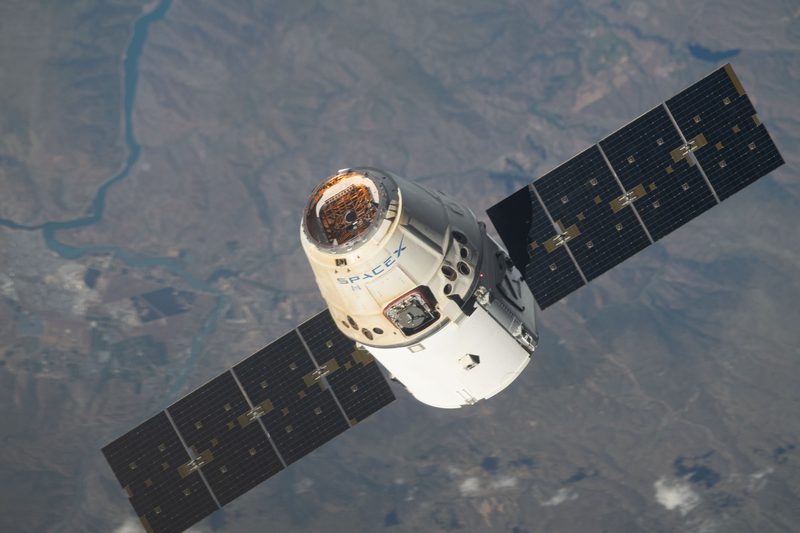 View of Earth and Space X module from the ISS