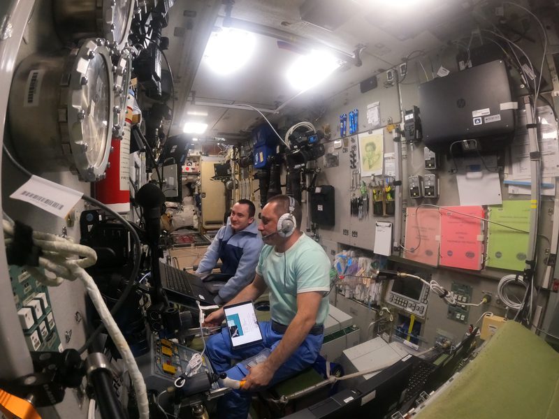 Roscosmos cosmonauts Anton Shkaplerov and Pyotr Dubrov inside the Zvezda service module